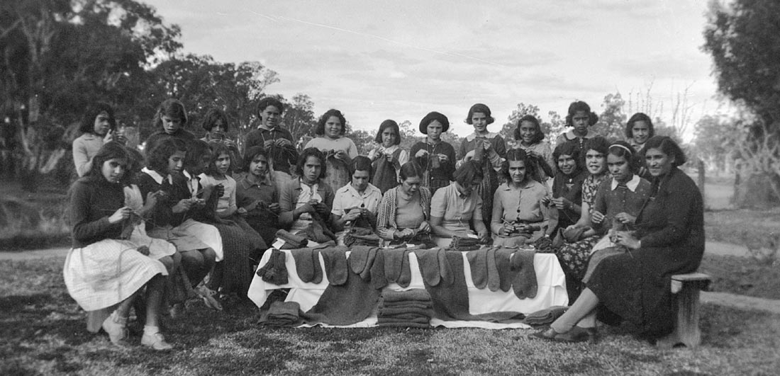 Aboriginal women and girls knitting for the war effort, 1941